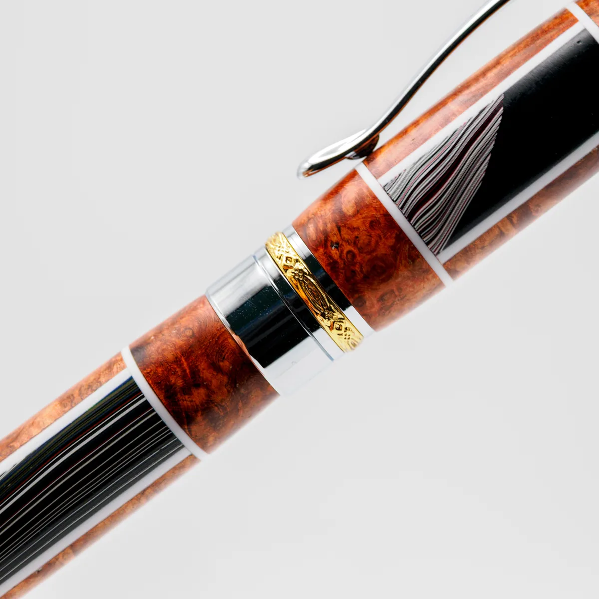 Jeep Fordite & Segmented Chechen Burl rollerball, sourced Jamaica & Detroit (fourth view)